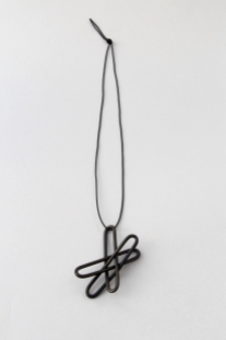 Debbie Adamson. Staples pendant. Steel, zinc, synthetic thread. 2015